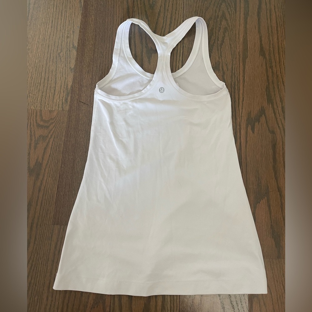 This is the Lululemon White Nulu Cool Racerback Tank Top in Size 4.